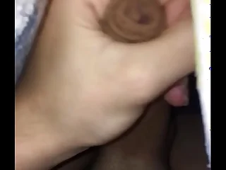 Gay Twink masturbating under someone's skin Sheets